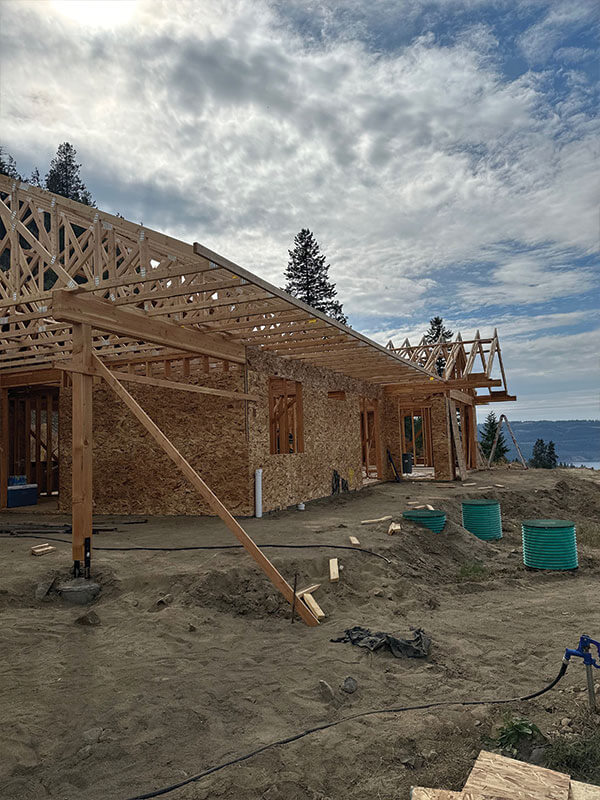 Framed home with roof trusses set by Gitter Done Construction crew in Davenport, Eastern Washington